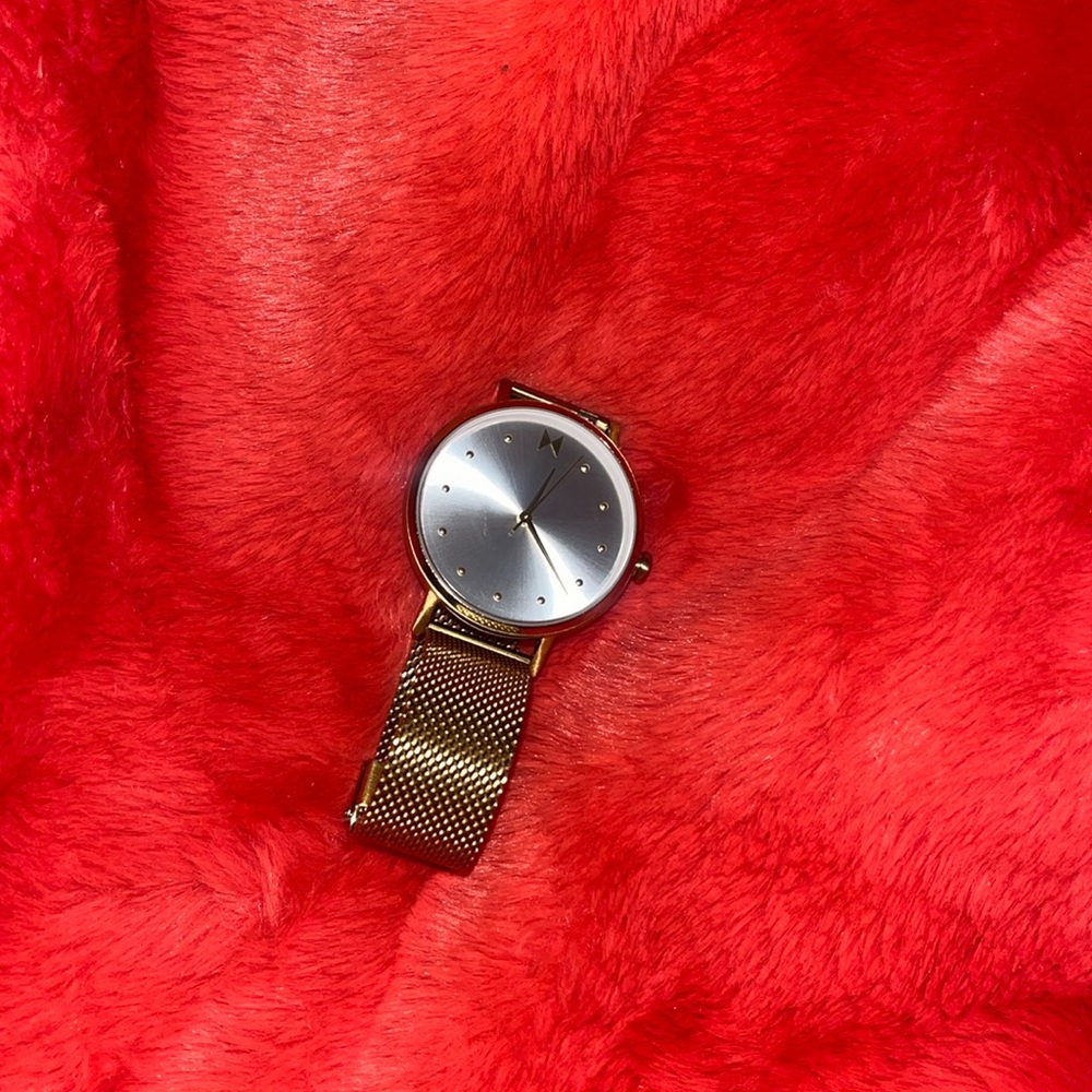 Gold MVMT watch